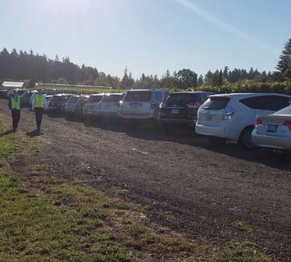 an event of cars valet parked in Oregon City lined up